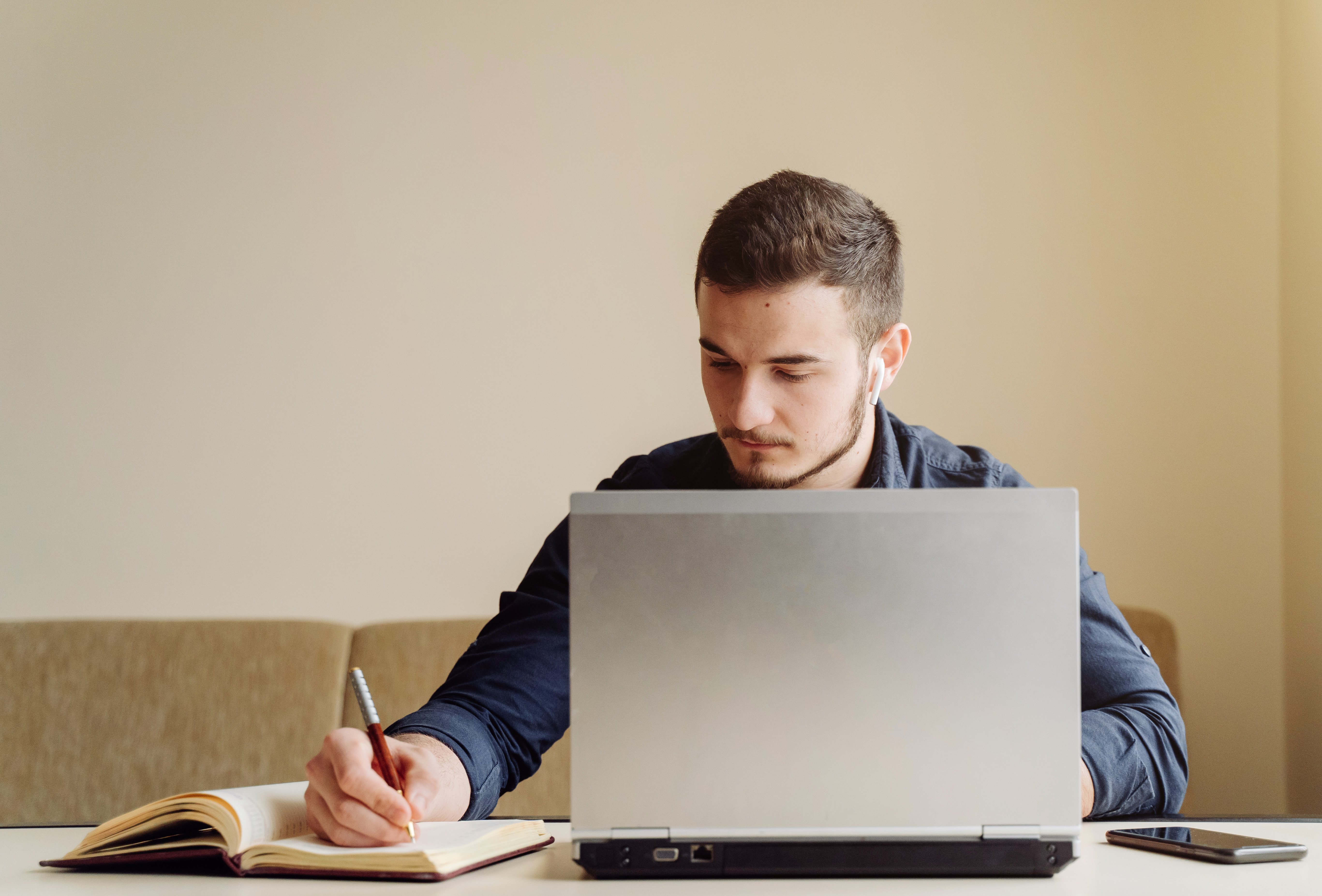 young-businessman-working-with-computer-remotely-1